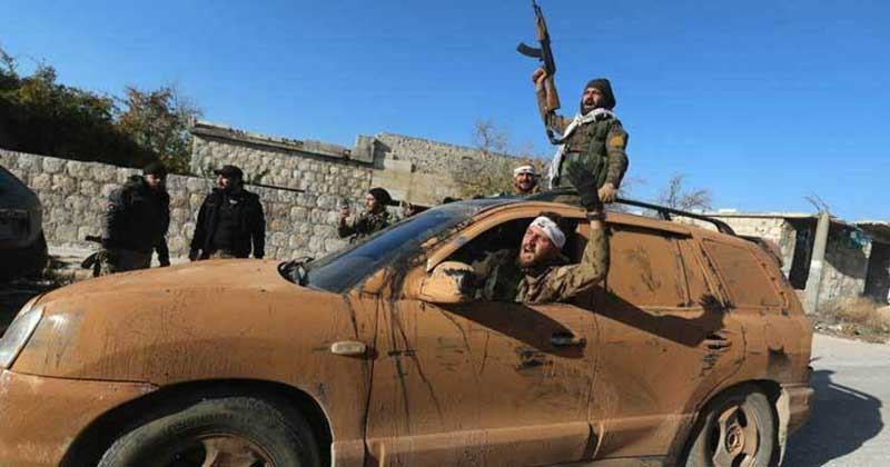 ইদলিবের নিয়ন্ত্রণ নেওয়ার পর সশস্ত্র বিদ্রোহীদের উল্লাস। ফাইল ছবি