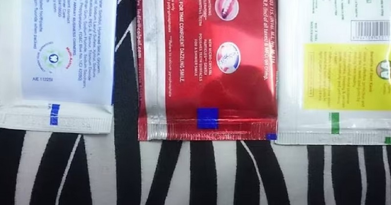 টুথপেস্ট টিউবের গায়ে ভিন্ন রঙের দাগের অর্থ কী? 